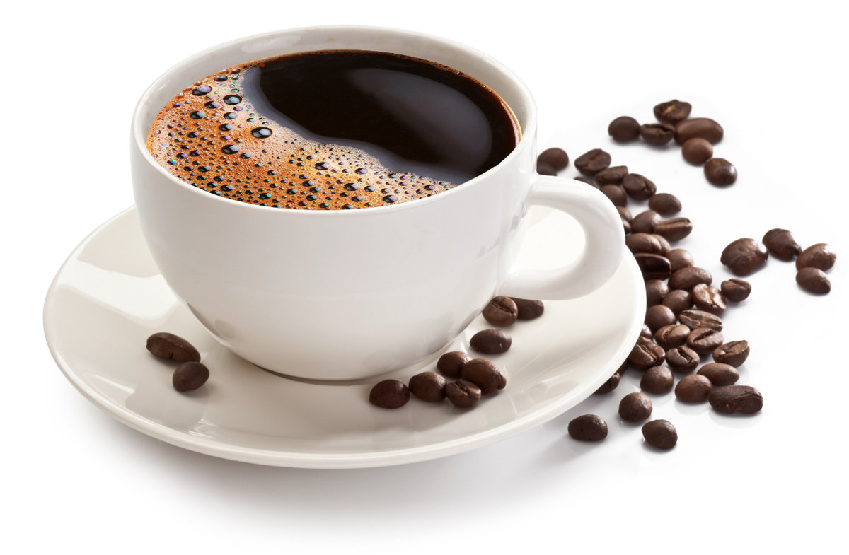 Coffee in mug with coffee beans